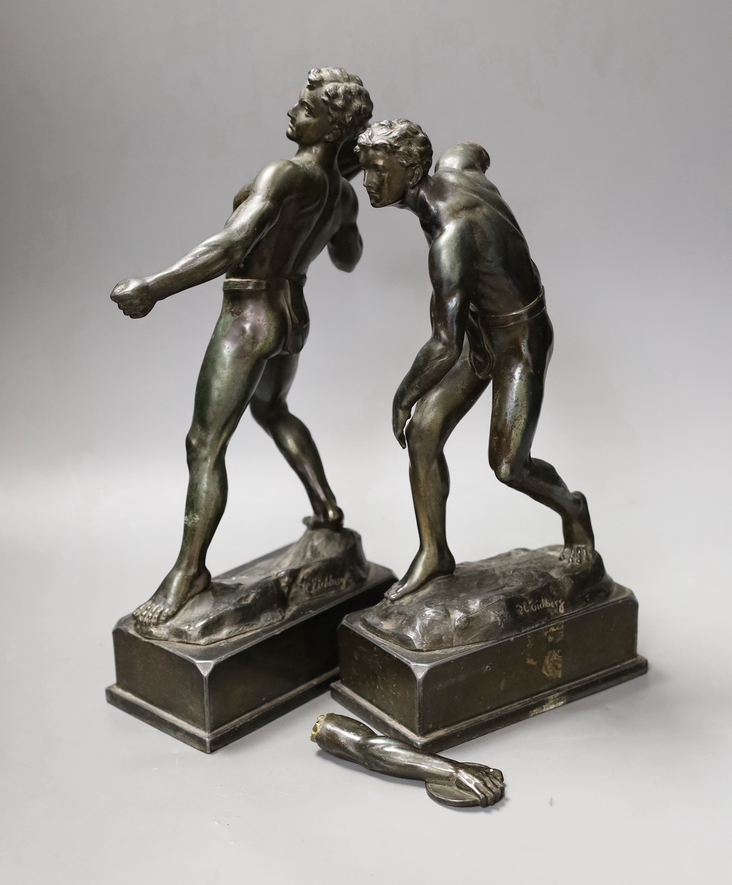 A pair of spelter athlete figures, a.f., tallest 34cms